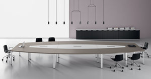 Barrel Shaped Meeting Room Table with Cube Metal Legs in Walnut Finish Mobile Armchairs in Meeting Room Setting