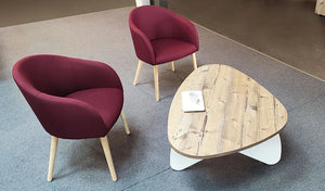 Buronomic Pebble Design Coffee Table In Oak Top Finish With Red Armchair In Living Room Area