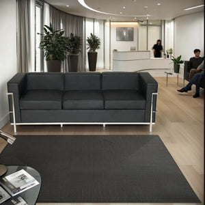 Elite Black Faux Leather 3 Seater Sofa in Reception Setting