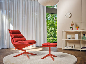 Fat Frank Lounge Chair with Footrest and Shelving Unit in Living Room Setting