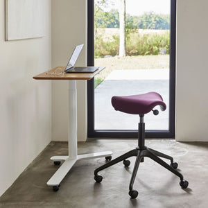Float Mini Home Office Sit Stand Desk With Movement Chair In Breakout Setting