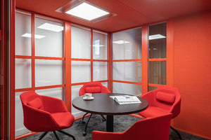 Hako Meeting Booth XL with Round Table and Tub Chairs in Breakout Setting 2