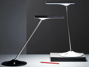 Humanscale Horizon 2 Adjustable Desk Light With Touch Dimming Feature In Black And White On White Table