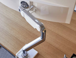 Humanscale M10 Adjustable Monitor Arms For Up To 3 Monitors 6 In Polished Aluminum With White Trim In Wooden Table With White Monitor
