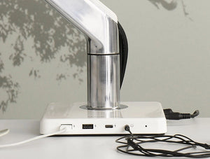 Humanscale Mpower Usb Type A And C Charging Station 5 In White With Cords On White Table