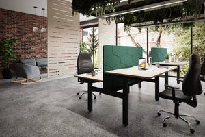 Koala Leap Bench Screen in Dark Green Finish Attached to Sit Stand Bench Desk with Black Office Armchair and Grey Rocking Chair in Modern Office Settings