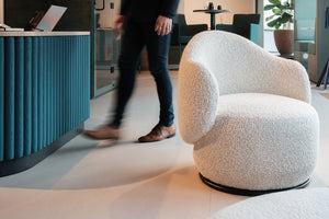 Luna Soft Seating Swivel Chair with Reception Desk in Lounge Setting