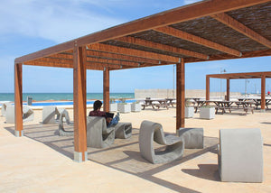 Petrus Outdoor Deck Chair with Tables and Benches by the Beach Area