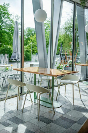 Team Polypropylene Ergonomic Low Stool with Canteen Table in Canteen Setting