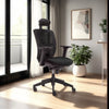 Action Ergonomic Task Chair with Hightop Table and Indoor Plant in Modern Office Setting