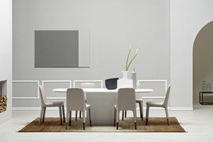 Aero Dining Table in White Finish with Beige Chair in Dining Setting