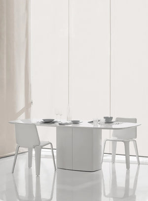 Aero Dining Table in White Finish with White Chair in Breakout Setting
