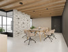 Alega 2 Piece Meeting Table in Sonoma Oak Finish with Pink Finish Jupiter Mobile Meeting Room Chair in Modern Office Setting