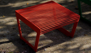 Arte Outdoor Low Stool in Outdoor Setting
