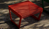 Arte Outdoor Low Stool in Outdoor Setting