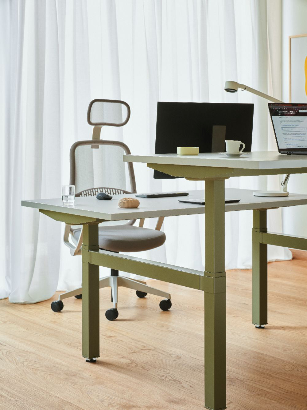 Astro Mesh Task Chair with Headrest with Sit Stand Bench Desk and Table Lamp in Modern Office Setting