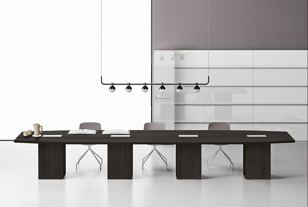Barrel Shaped Meeting Room Table with Cube Legs in Dark Oak Finish with Swivel Base Chair in Meeting Room Setting
