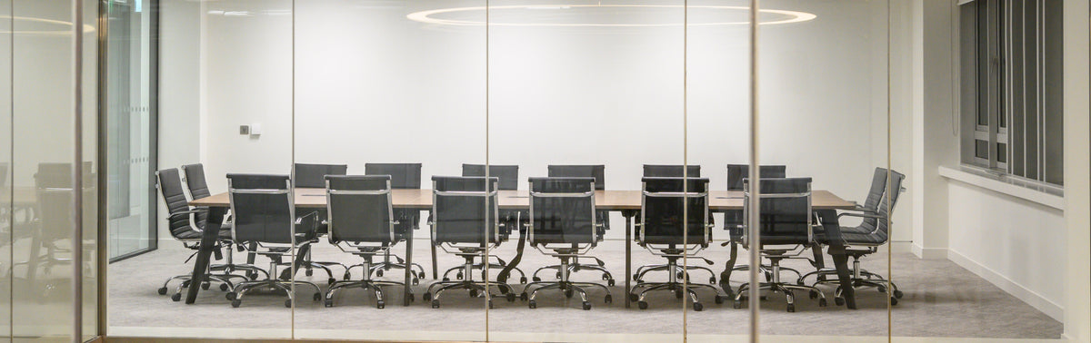 Boardroom Chairs With Wooden Long Meeting Room Table In Boadroom Setting