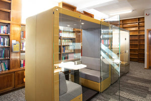 Bob 4 Person Meeting Pod with Wooden Bookshelves in Library Setting