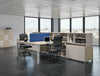 Buronomic Astro Desk for Open Space 5 with blue table division on tabletop and black chair in office