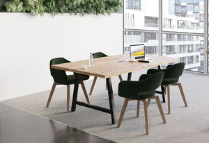 Buronomic Cohesion Co Working Table In Oak Top Finish With Dark Green Armchair In Meeting Room Setting
