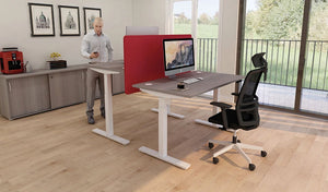 Buronomic Envol Evo Electric Sit Stand Desk In White Leg Finish With Black Armchair And Wooden Cabinet