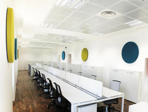Buzziland Acoustic Panel 6 In Different Colors With White Long Table And Black Chair In Working Space
