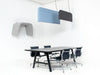 BuzziShield Acoustic Ceiling Light with Armchair and Table in Office Setting