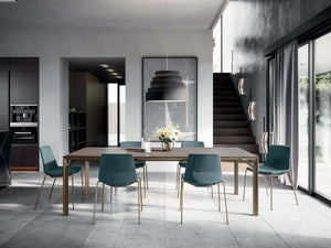 Clue Dining Chair In Green With Metal Legs And Wooden Top Table In Dining Room Setting
