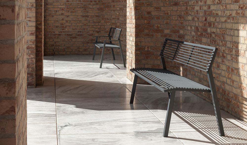 Coro Metal Outdoor Bench in Outdoor Setting