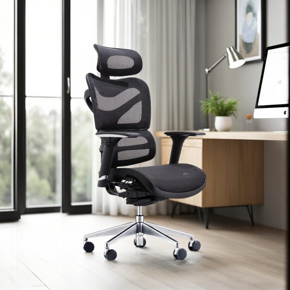 Dorsum Ergonomic Full Mesh Chair with Table Lamp and Wooden Table in Modern Office Setting