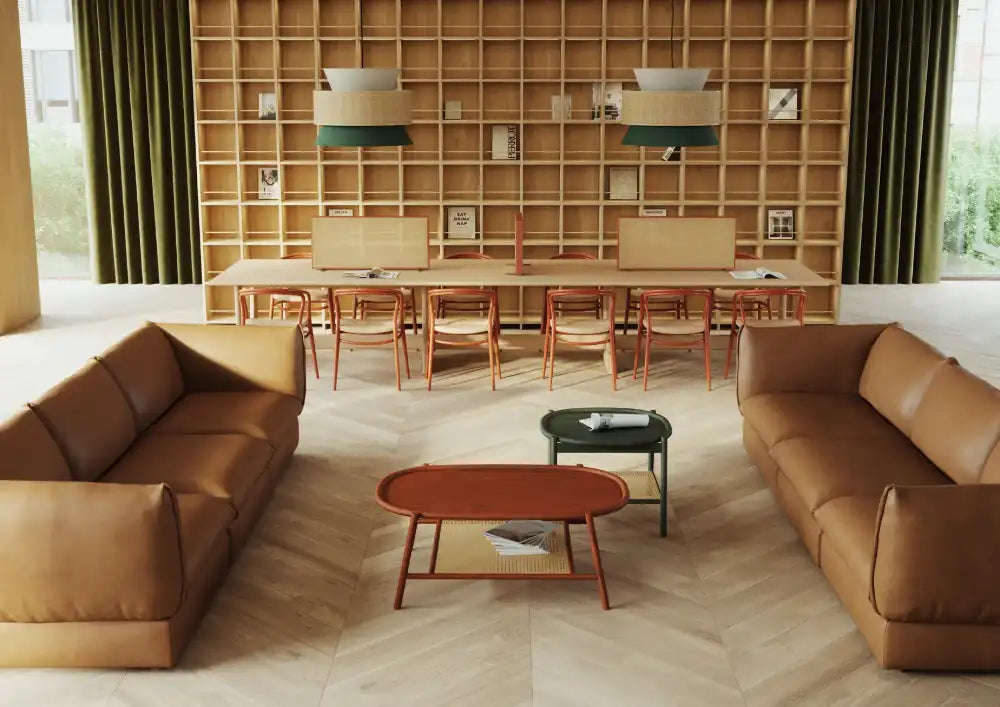 Drum Oval Low Coffee Table with 3 Seater Sofa and Wooden Table in Modern Office Setting