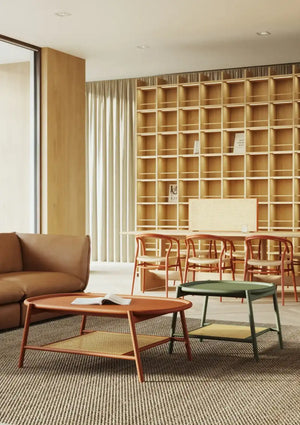Drum Oval Low Coffee Table with Meeting Room Chair and Bookshelves in Modern Office Setting
