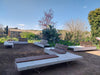Ela Plus Rectangular Outdoor Bench in Two Toned Finish with Other Benches in Outdoor Setting