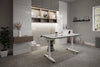 FlipMe Convertible Standing Desk with Banffy Stool and Wooden Shelving in Home Office Setting