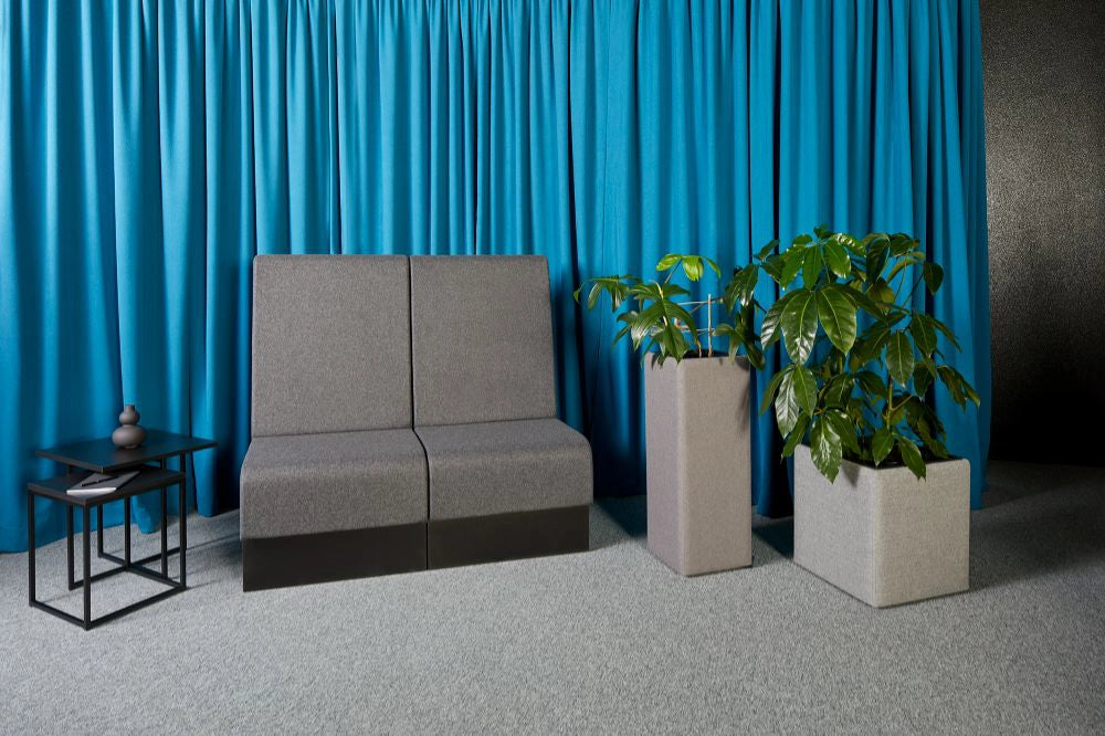 Floris Upholstered Pot in Different Finishes with Grey Modular Seating and Black Coffee Tables 2
