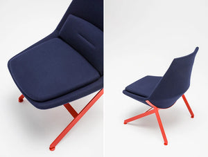 Frank Comfy Lounge Armchair With Four Legged Base With Blue Upholstery And Red Leg Base Close View