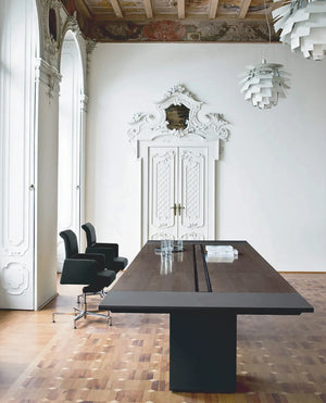 Frezza Ono Meeting Table With Black Armchair And White Ceiling Lamp In Living Room Setting