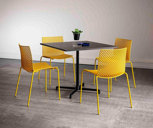 Fuller Stackable Chair With Square Table In Breakout Setting