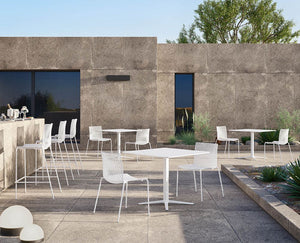 Fuller Stackable Chair With Square Table In Outdoor Setting