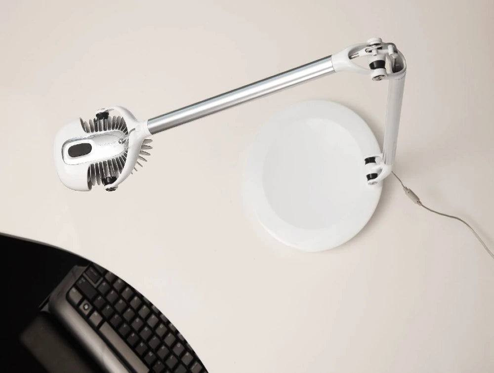 Humanscale Ergonomic And Dimmable Element 790 Desk Light 5 In White On White Desk With Black Keyboard