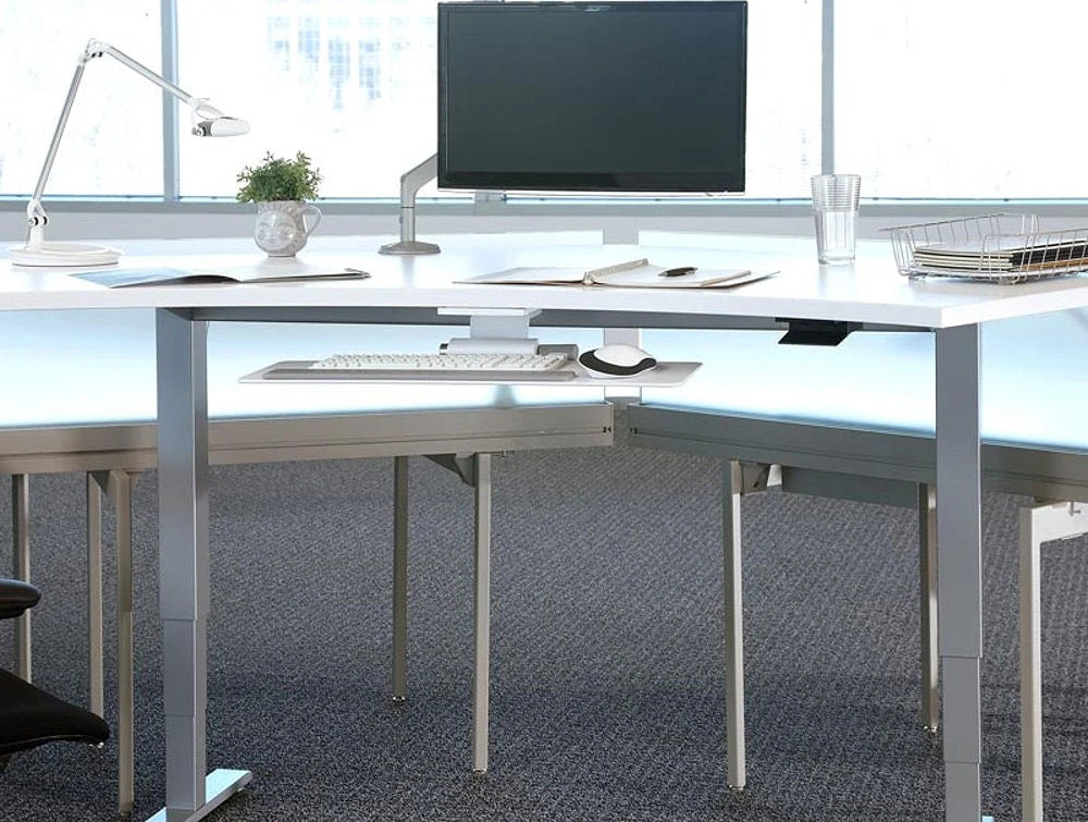 Humanscale Float Standing Office Desk For Office Or Home Areas 7 In White With Single Monitor And Desk Lamp