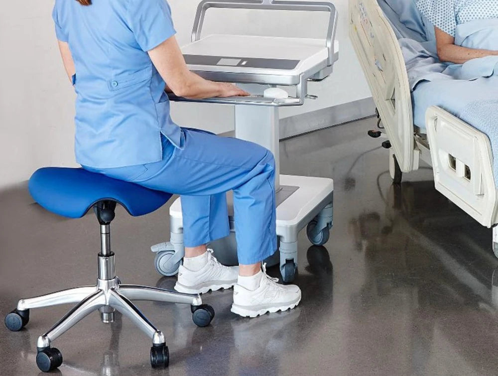 Humanscale Freedom Saddle And Pony Task Stool With Triangular Cushion 5 With Polished Aluminum And Blue Finish With Mobile Work Desk