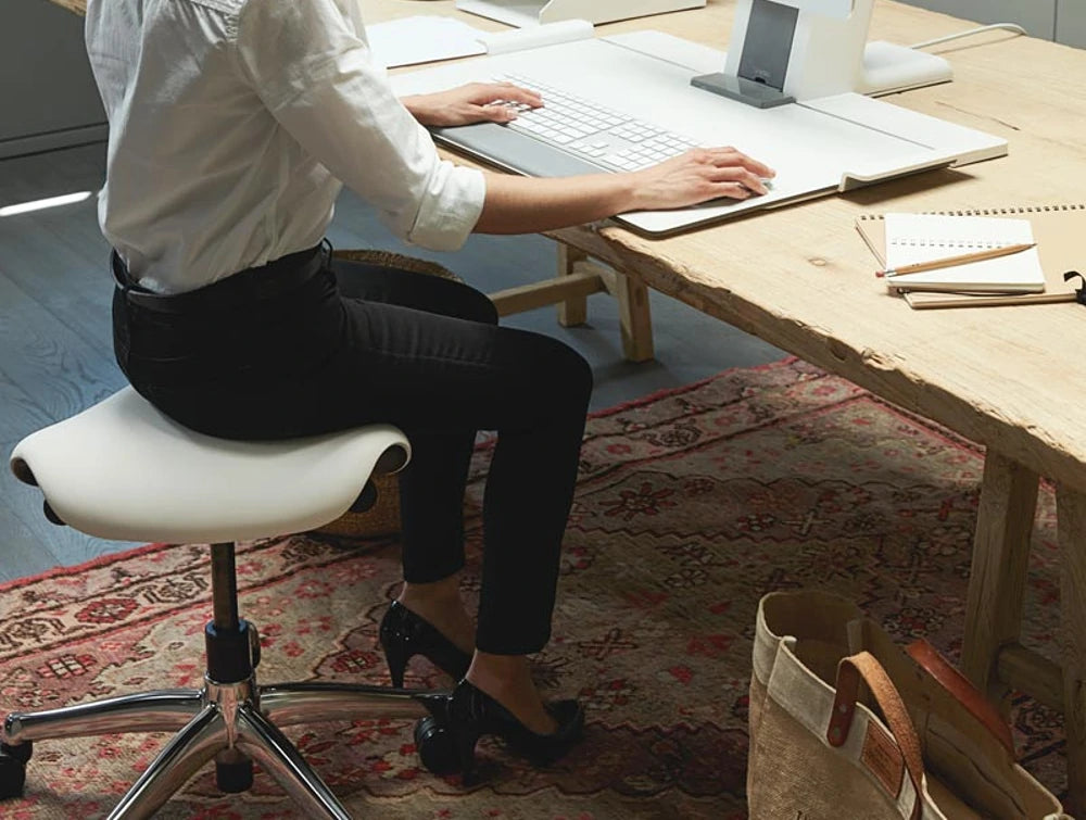 Humanscale Freedom Saddle And Pony Task Stool With Triangular Cushion 7 With Polished Aluminum And White Finish With Wooden Desk