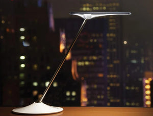 Humanscale Horizon 2 Adjustable Desk Light With Touch Dimming Feature In White On Wood Top Table