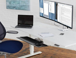 Humanscale Mconnect 2 Docking Station For Thunderbolt Notebooks In White In White Desk With Blue Swivel Chair