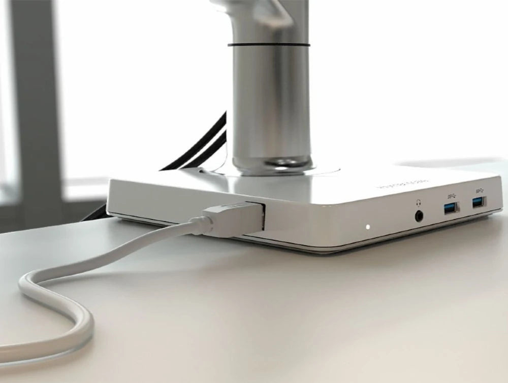 Humanscale Mconnect Docking Station With Usb Hub 4 In White On White Desk With White Wire