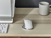 Humanscale Pro Click Ergonomic Mouse With Advanced Optical Sensor On Wooden Table