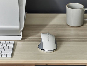 Humanscale Pro Click Ergonomic Mouse With Advanced Optical Sensor On Wooden Table