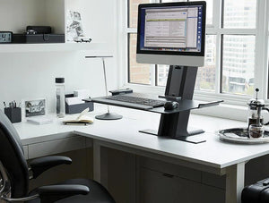 Humanscale Quickstand Sit To Easy And Portable Desk Converter 6 In Black With Single Monitor In Office